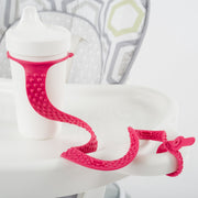 BooginHead SippiGrip Silicone in hot pink, strap to hold a sippy cup, bottle or toy, with soothing teething bumps.