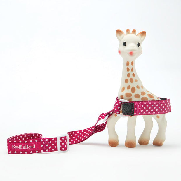 BooginHead SippiGrip in Pink Polka Dots, keeps sippy cup, baby bottles and toys from falling on the ground getting dirty or lost. Keeps baby items off the ground and clean