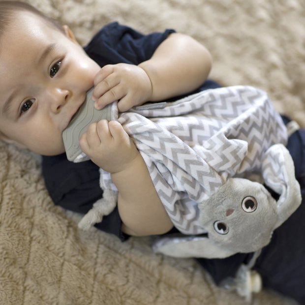 Baby soothing gums with machine washable lovey blanket from BooginHead. Plush PaciPal Teether Blanket, Floppy the Bunny.